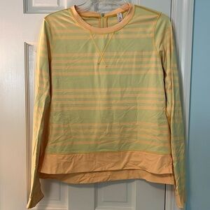 Lululemon nylon and spandex top.  Great for yoga topper , swim , riding , fun